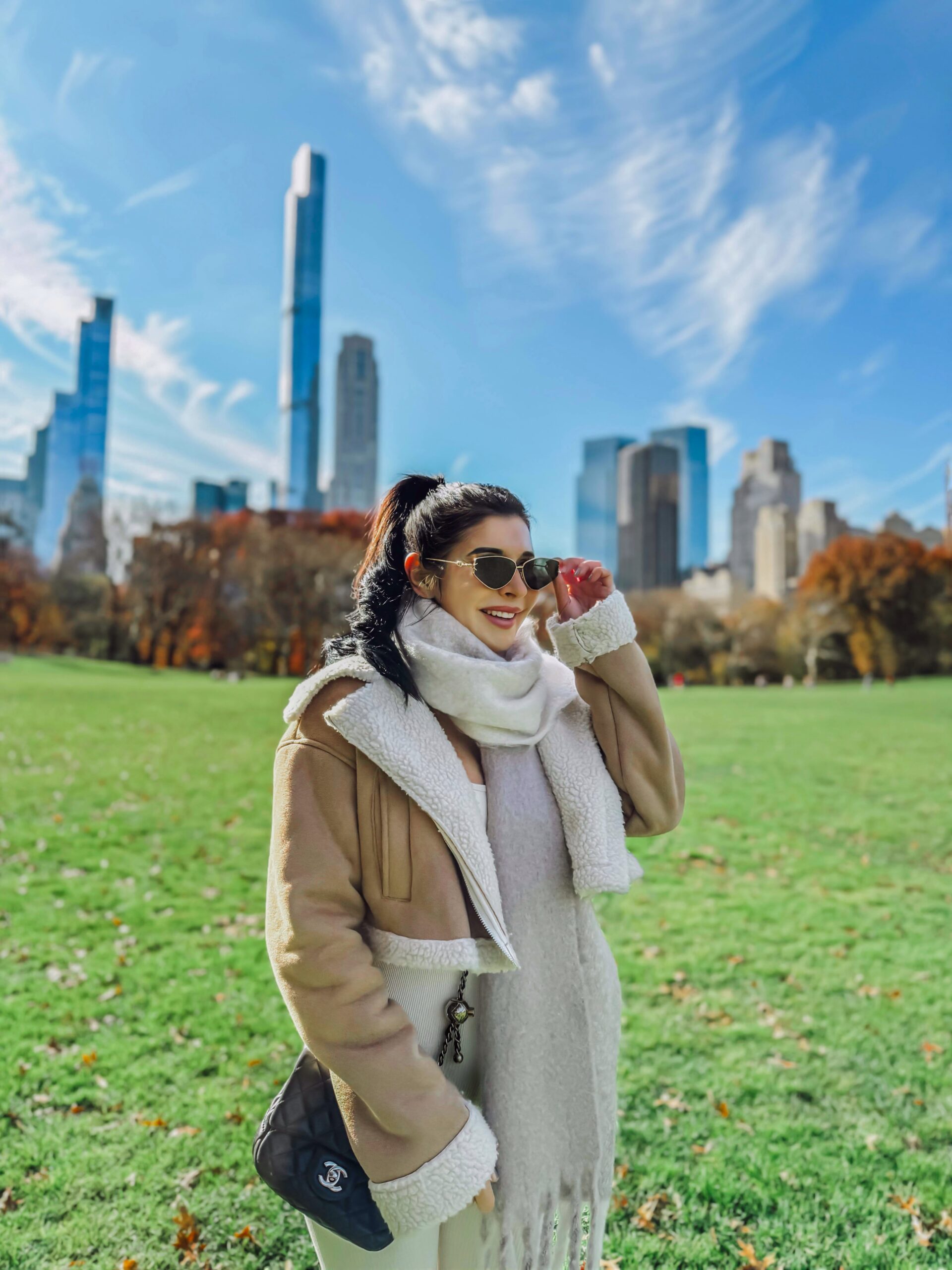 winter cozy outfit central park new york crop leather fur jacket